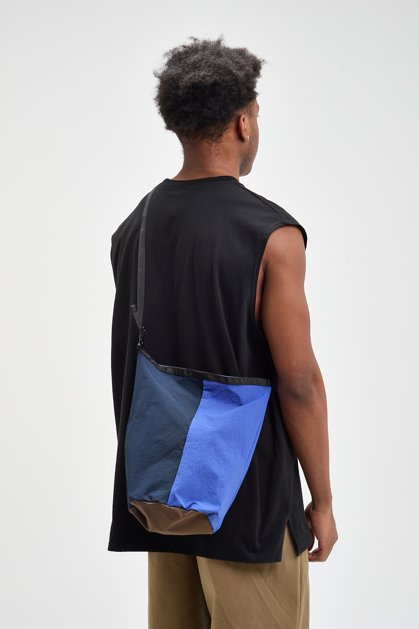 Sleeveless Tee – Newkid Archive