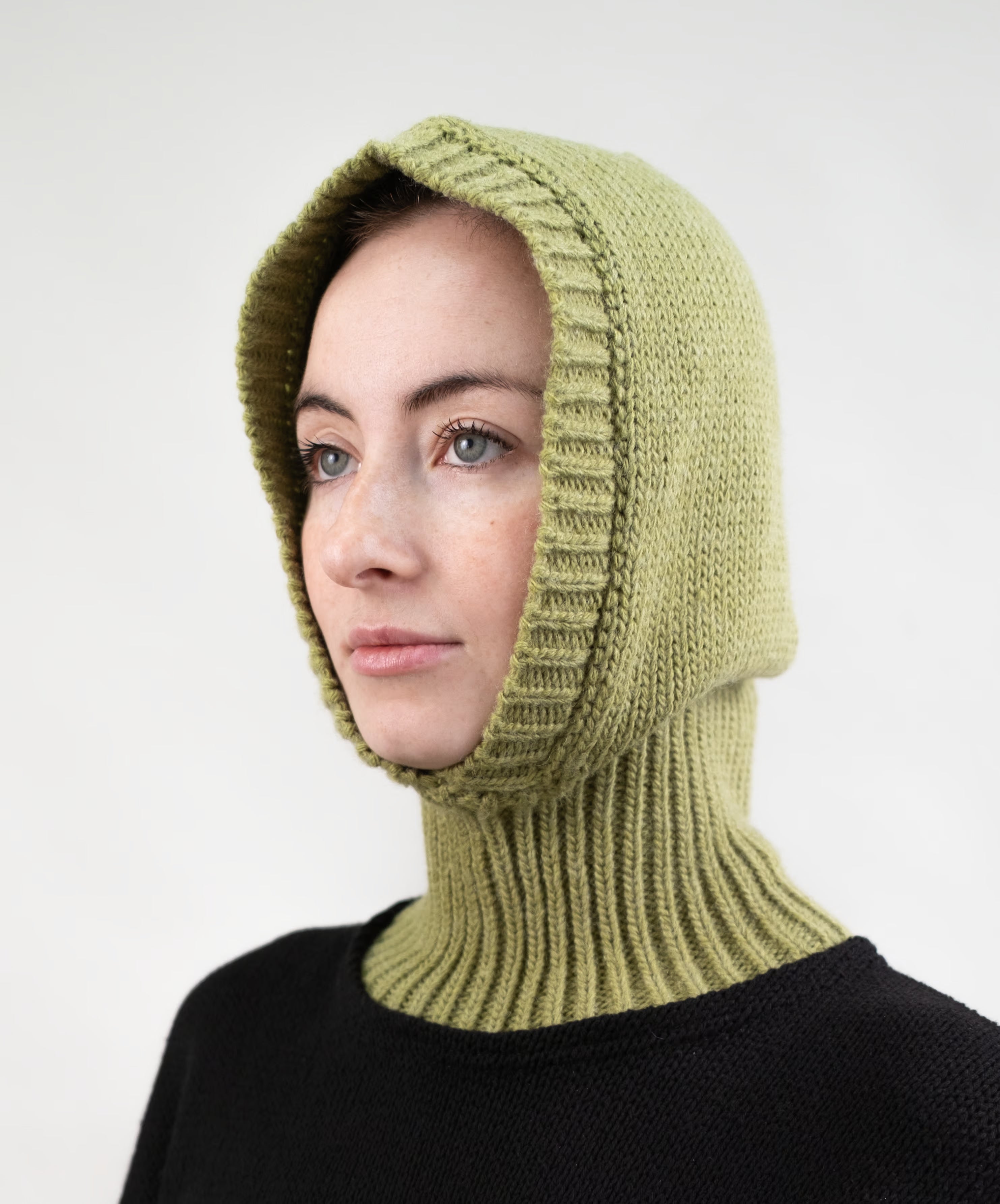 Wool blend balaclava with minimal silhouette and extended neck