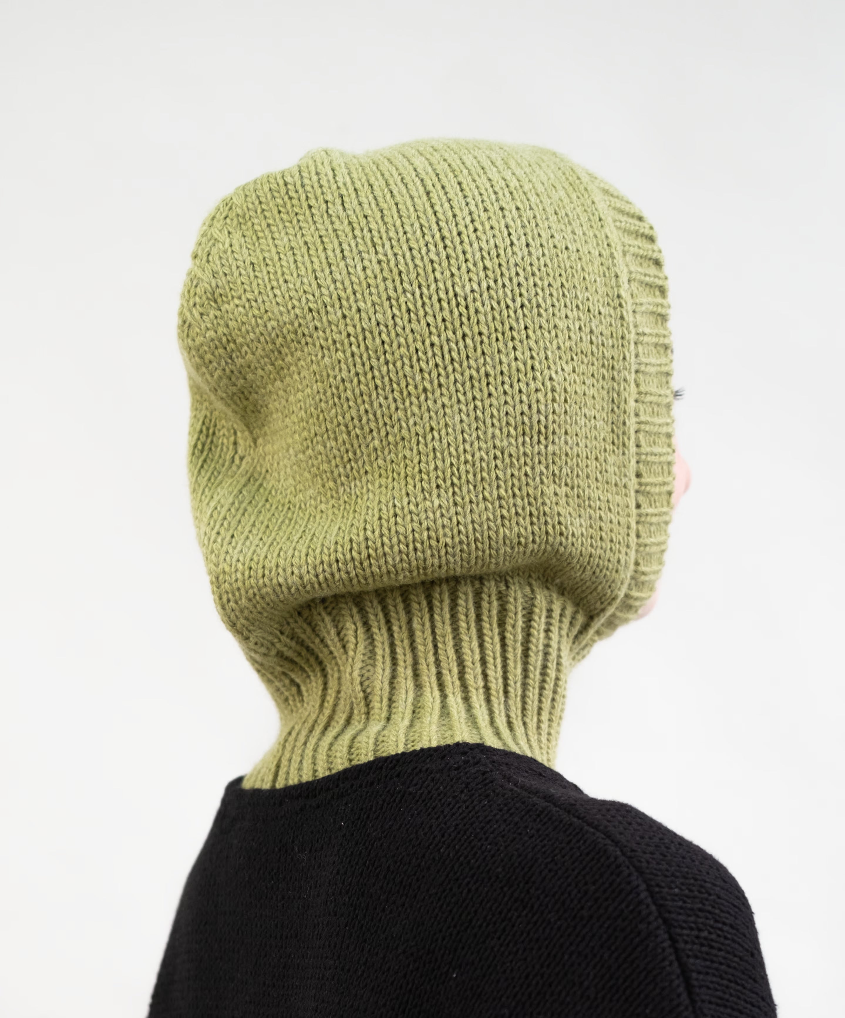 Profile view of wool blend balaclava