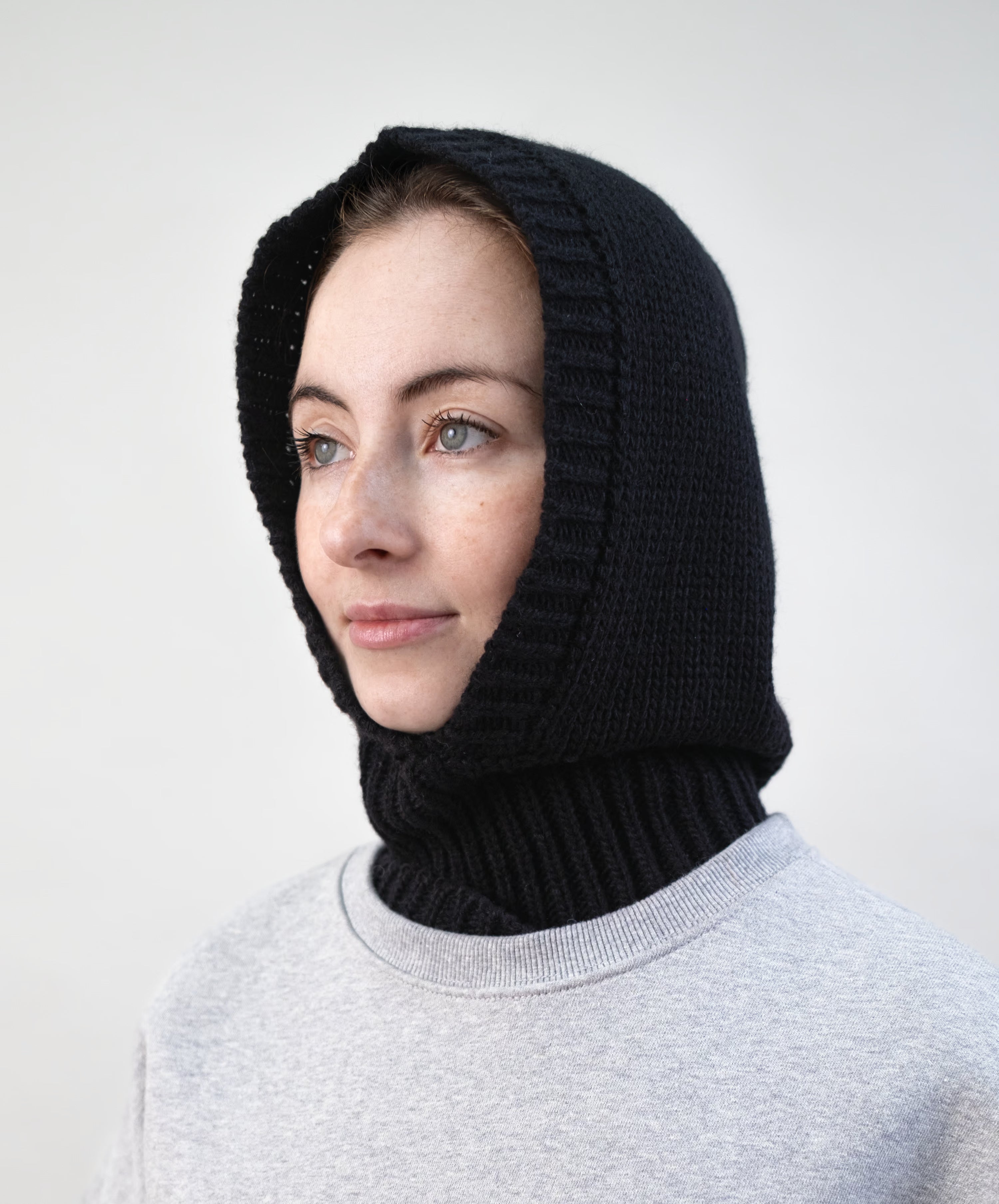Back view of wool blend balaclava showing neck coverage