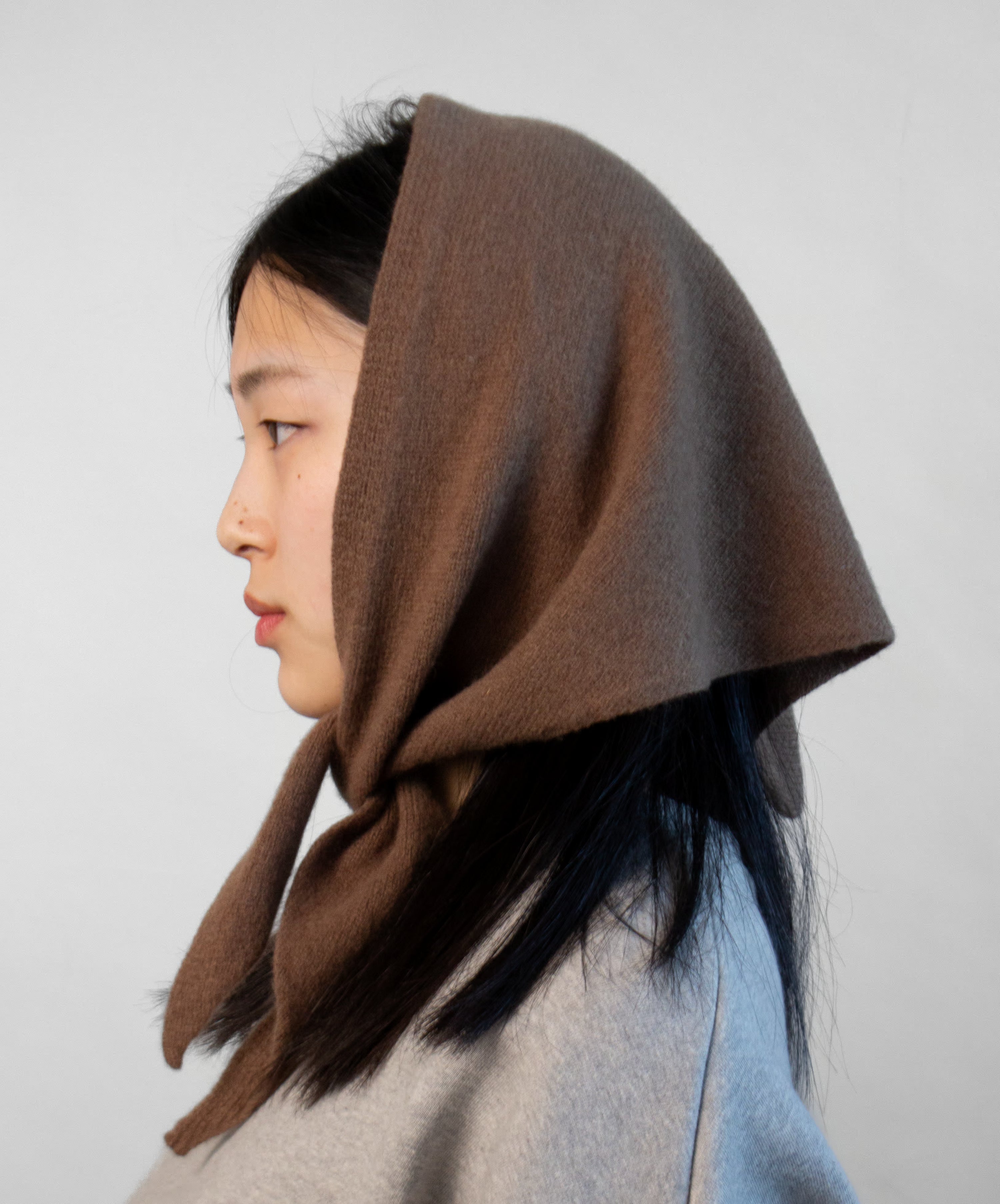 Pure wool bandana scarf worn as a neck scarf