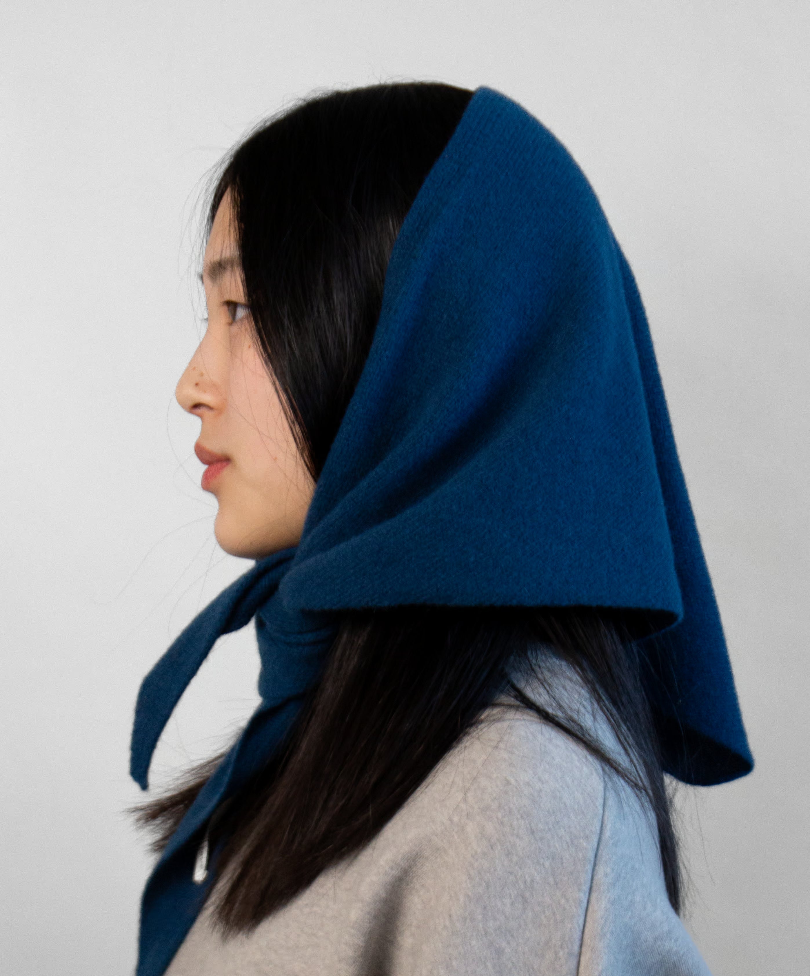 Pure wool bandana scarf worn as a head covering