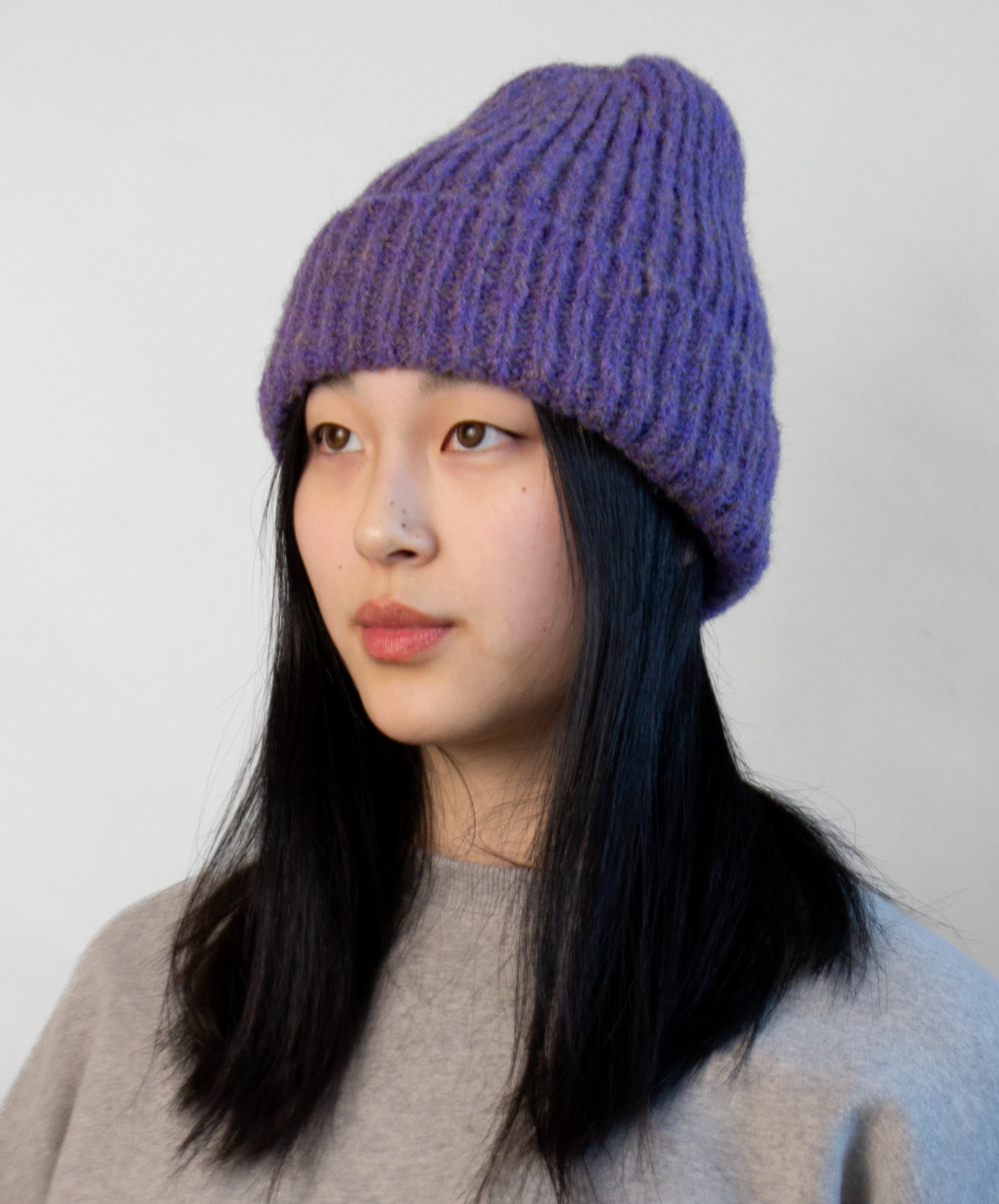 Tweed yarn beanie with textured knit pattern