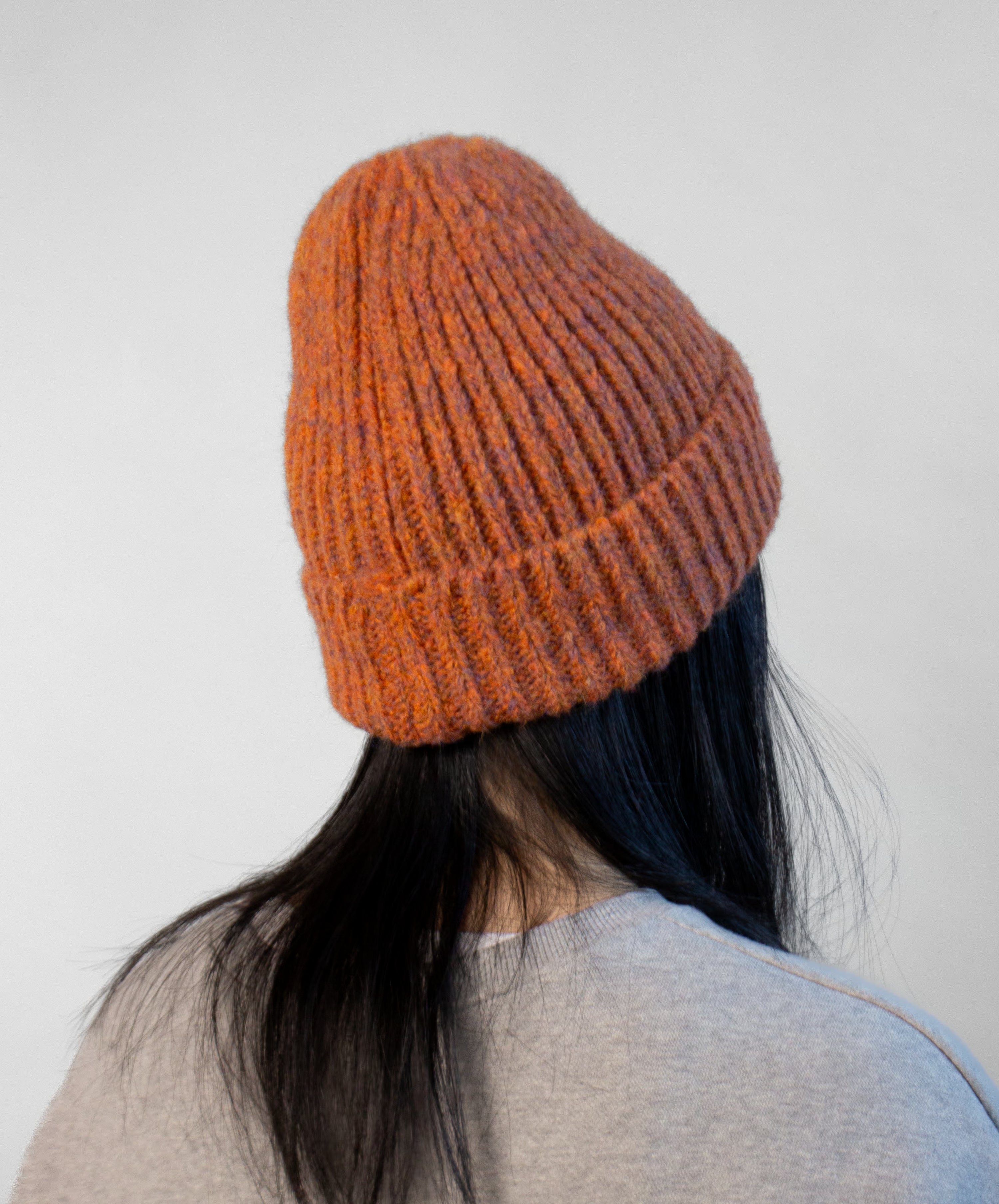 Side view of tweed yarn beanie