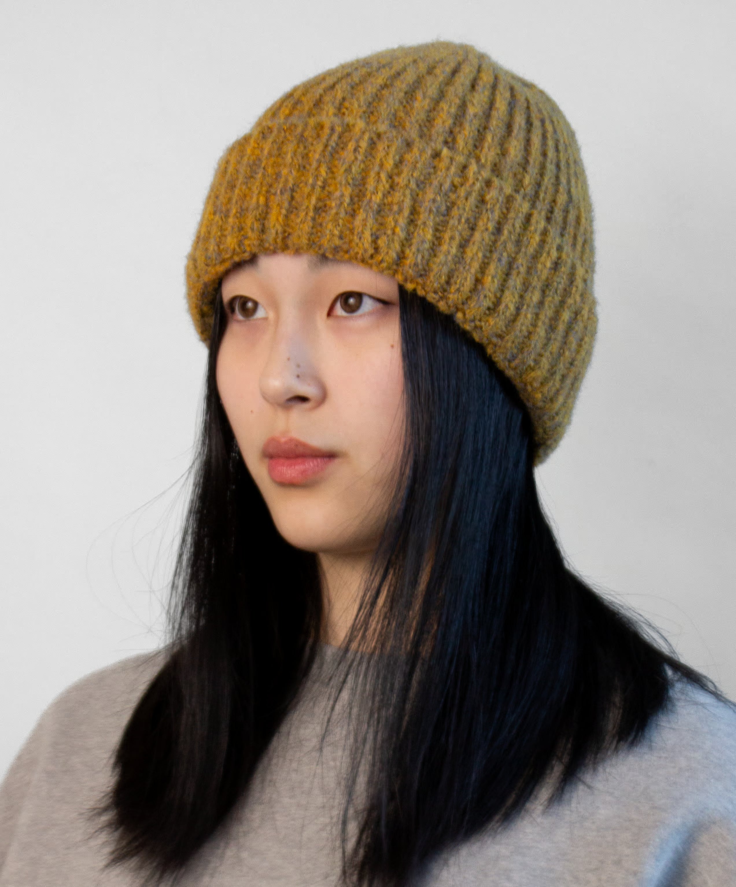 Tweed yarn beanie with structured ribbed texture